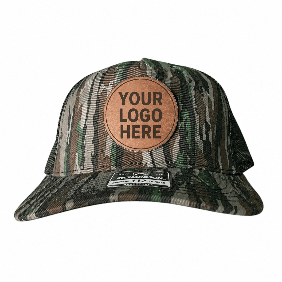 Camo Richardson 112 trucker hat with a custom engraved leatherette logo patch