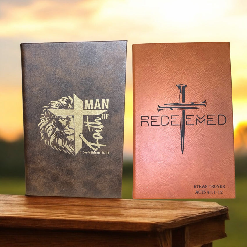 Two custom engraved leatherette journals with faith-based designs